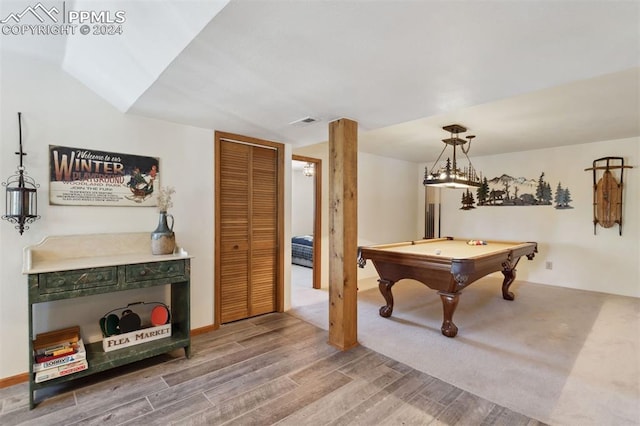 rec room featuring hardwood / wood-style floors, pool table, and vaulted ceiling