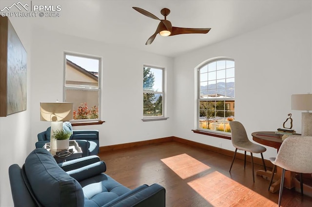 2933 Cathedral Park Vw, Colorado Springs, CO 80904 - living area featuring wood finished floors, ceiling fan, and baseboards