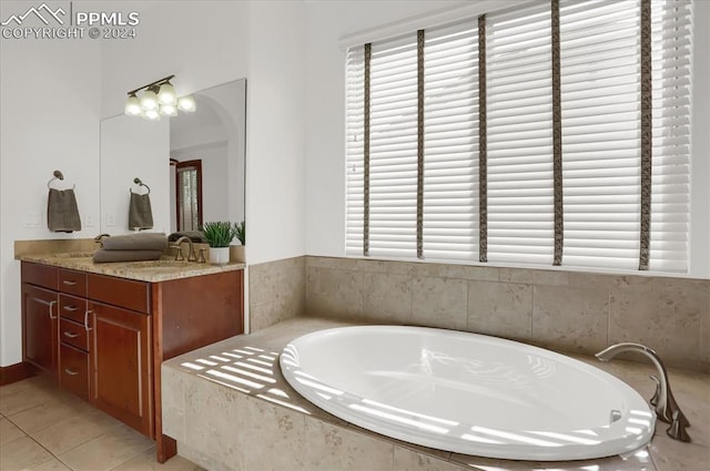 2933 Cathedral Park Vw, Colorado Springs, CO 80904 - full bathroom with double vanity, a garden tub, and tile patterned flooring