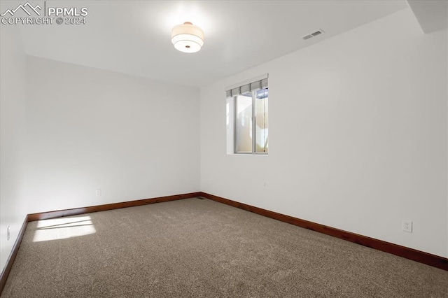 2933 Cathedral Park Vw, Colorado Springs, CO 80904 - carpeted spare room featuring baseboards