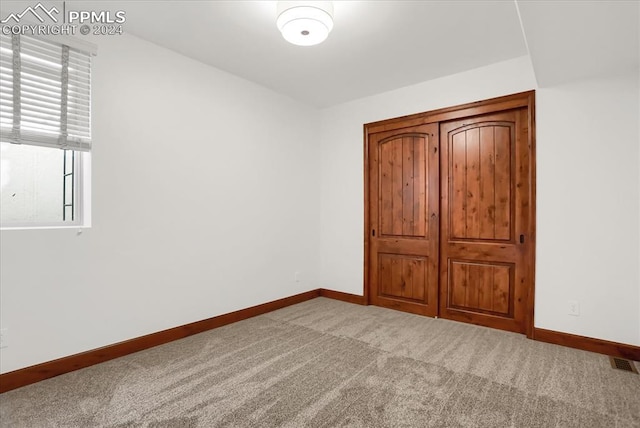 2933 Cathedral Park Vw, Colorado Springs, CO 80904 - unfurnished bedroom with carpet flooring and baseboards