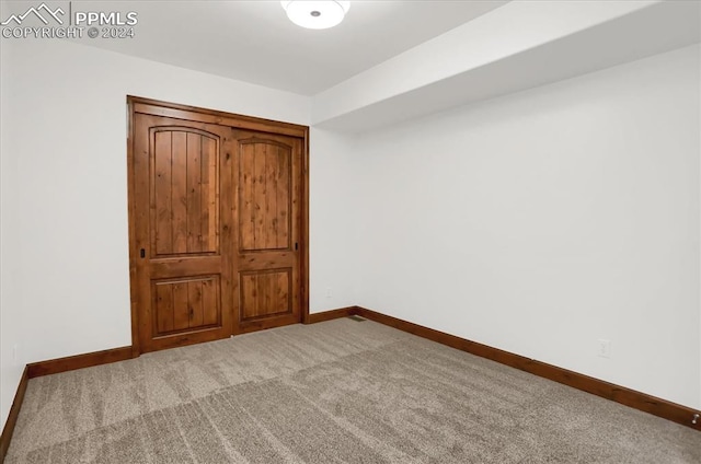2933 Cathedral Park Vw, Colorado Springs, CO 80904 - unfurnished bedroom with baseboards and carpet flooring