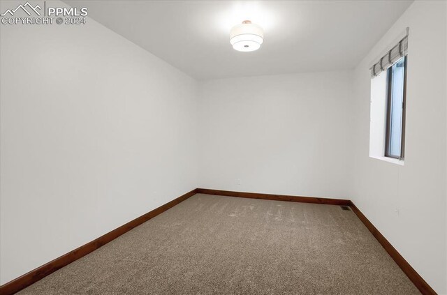 2933 Cathedral Park Vw, Colorado Springs, CO 80904 - empty room with carpet floors and baseboards