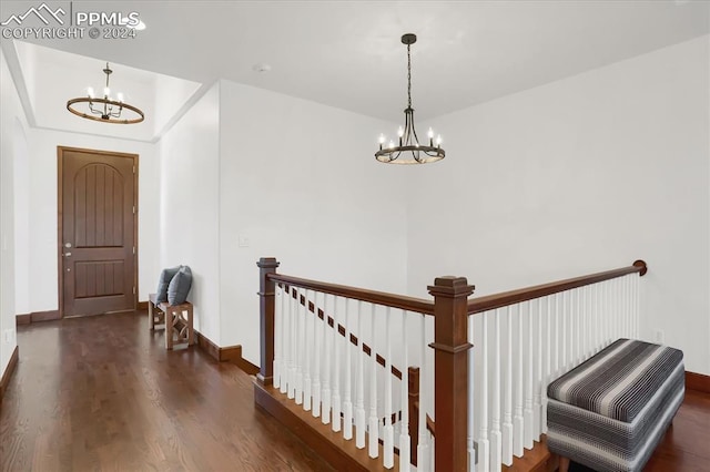 2933 Cathedral Park Vw, Colorado Springs, CO 80904 - foyer featuring a chandelier, wood finished floors, and baseboards