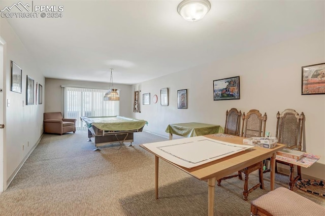 recreation room with light colored carpet and billiards