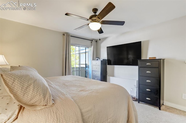 bedroom featuring ceiling fan and light colored carpet