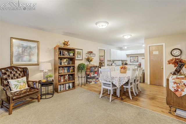 dining space featuring light hardwood / wood-style flooring