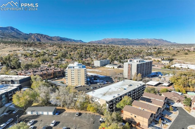 birds eye view of property featuring a mountain view