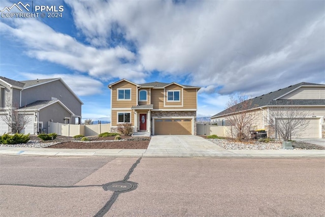 view of front of property featuring a garage