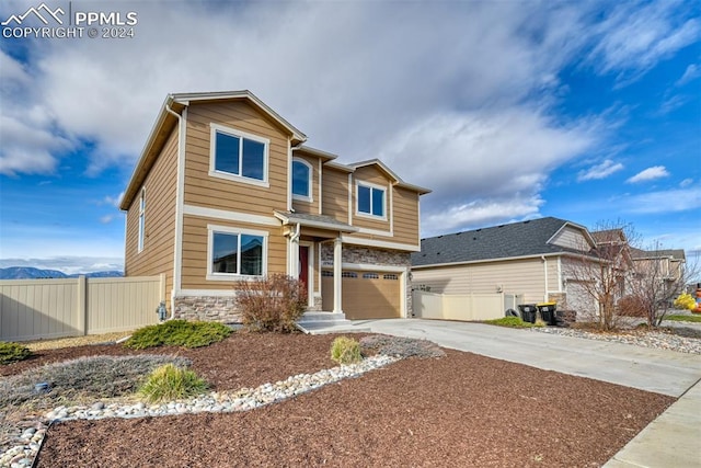 craftsman-style house featuring a garage