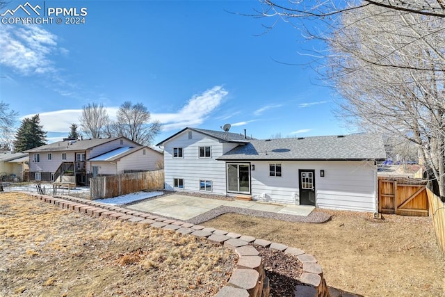 rear view of house with a patio area