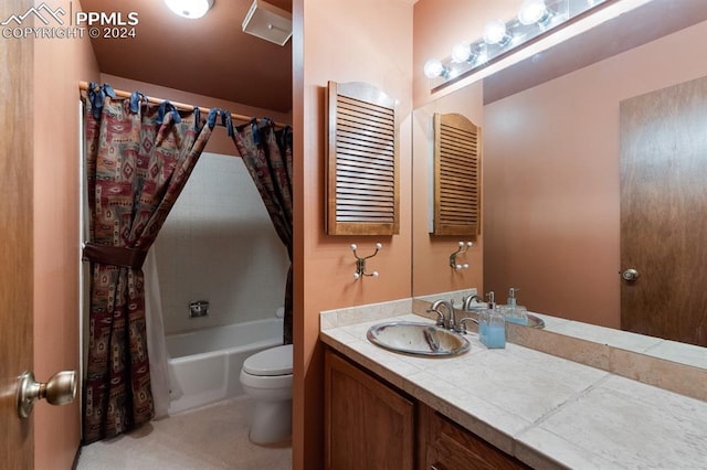 full bathroom with vanity, toilet, and shower / tub combo with curtain