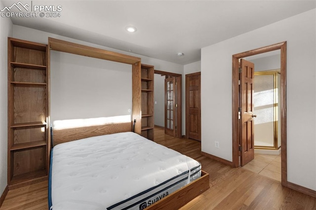 bedroom featuring light hardwood / wood-style floors