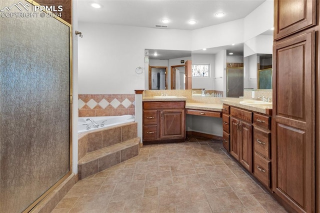 bathroom featuring vanity and plus walk in shower