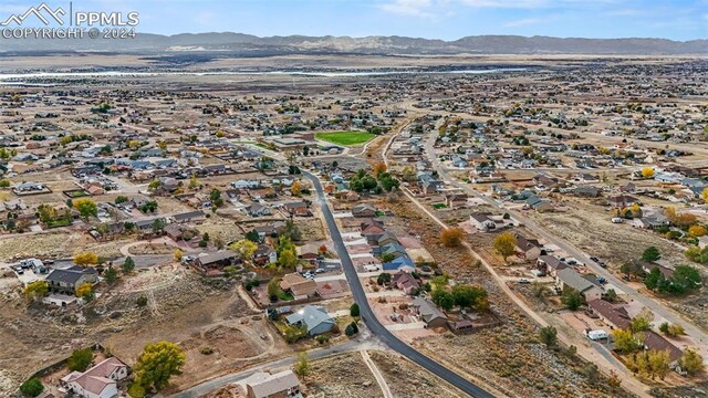 bird's eye view with a mountain view