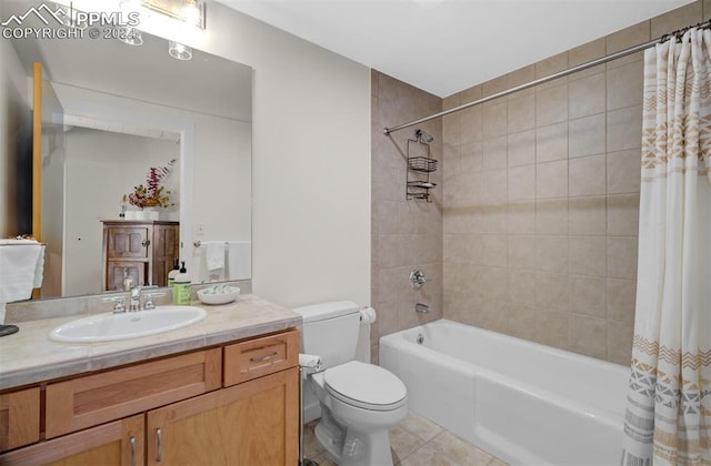 full bathroom featuring tile patterned flooring, shower / bath combination with curtain, toilet, and vanity