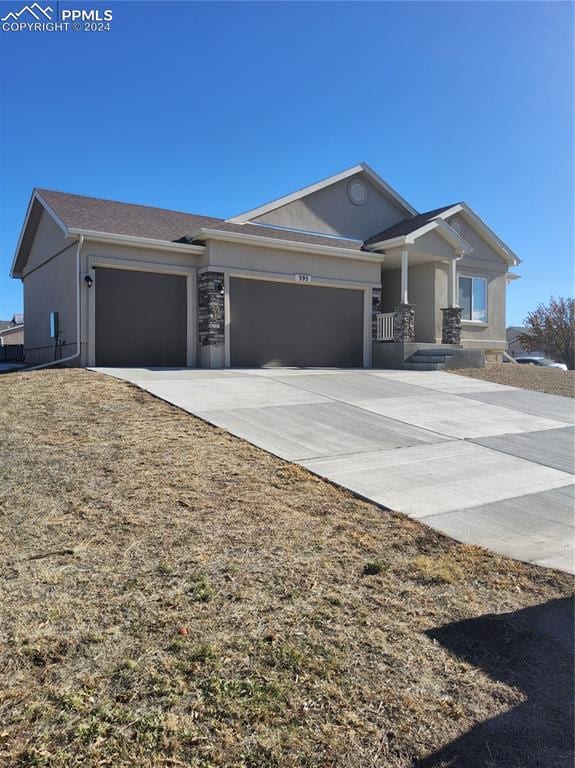 view of front of home featuring a garage