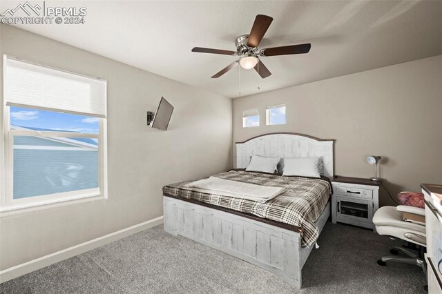 bedroom with carpet floors and ceiling fan