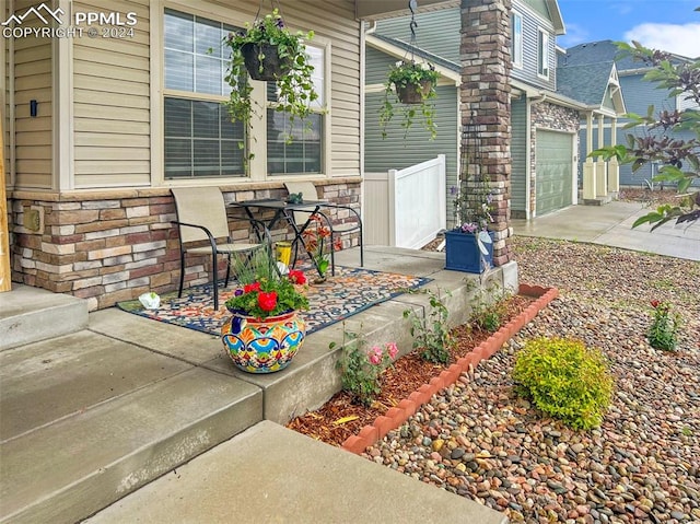 view of patio / terrace with a garage