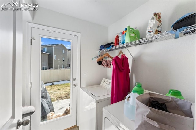 washroom with separate washer and dryer