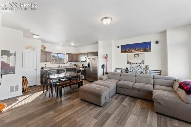 living room featuring dark hardwood / wood-style floors