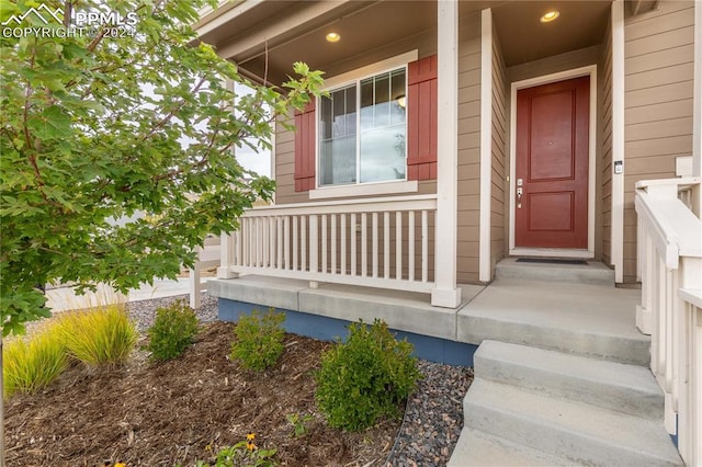 entrance to property with covered porch