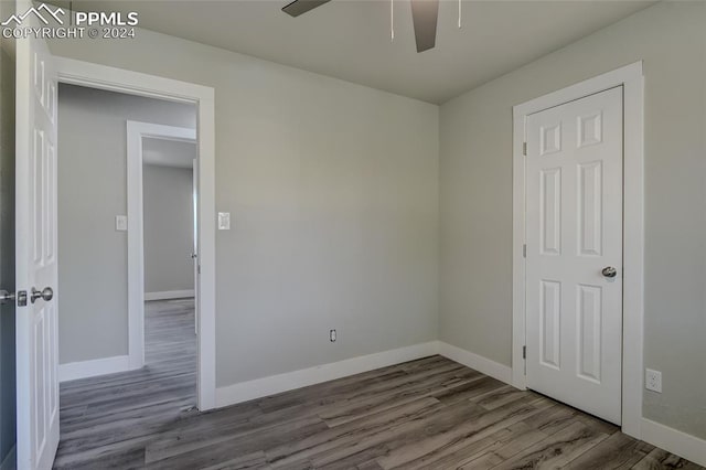 spare room with ceiling fan and light hardwood / wood-style floors