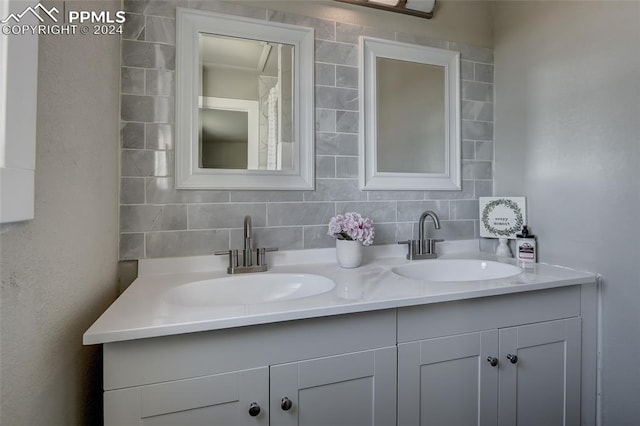 bathroom with vanity and backsplash