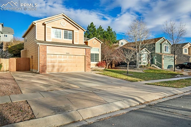 front of property with a garage