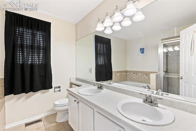 full bathroom with tile patterned flooring, vanity, toilet, and plus walk in shower