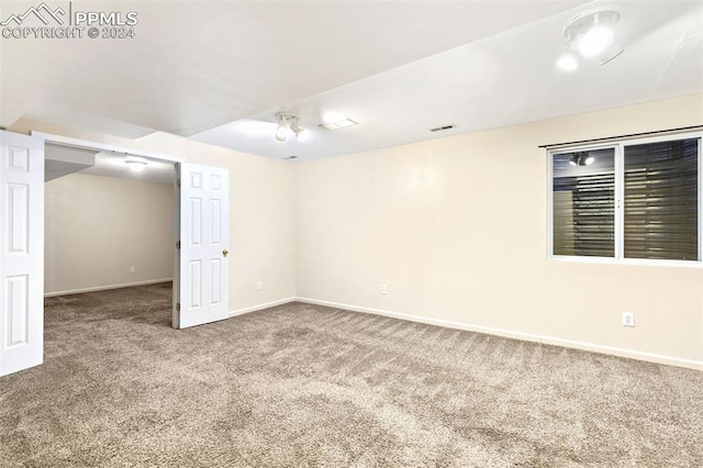 basement featuring carpet