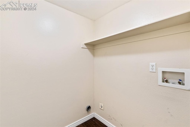 clothes washing area featuring washer hookup