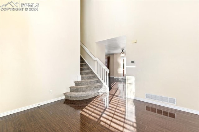 foyer featuring hardwood / wood-style flooring and ceiling fan