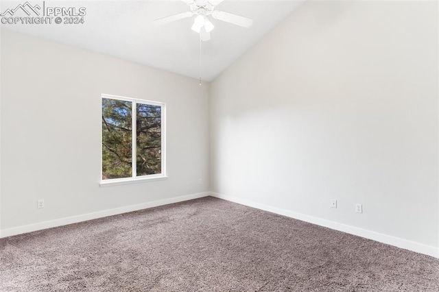 carpeted empty room featuring ceiling fan and lofted ceiling