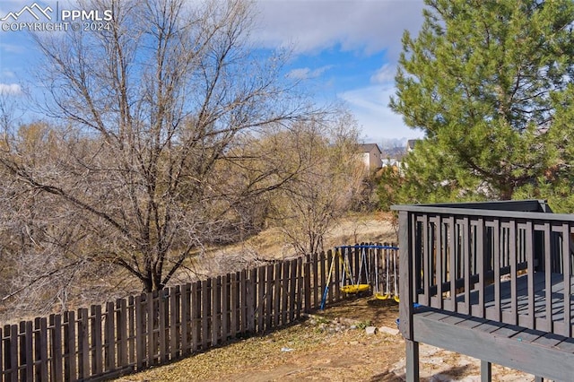 view of yard with a wooden deck