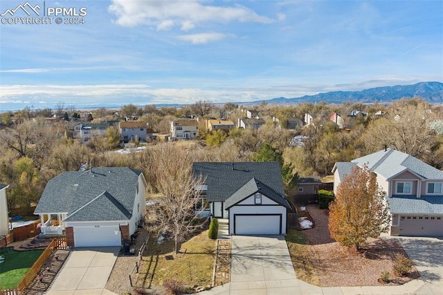 drone / aerial view featuring a mountain view