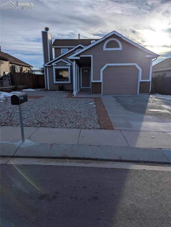 view of front of property with a garage