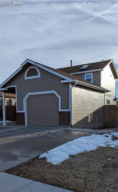 view of home's exterior featuring a garage