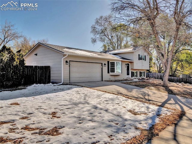 tri-level home featuring a garage