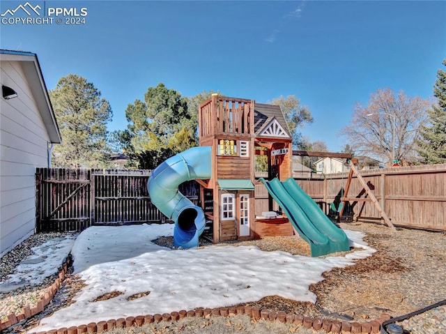 view of snow covered playground