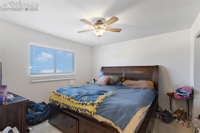 carpeted bedroom with ceiling fan