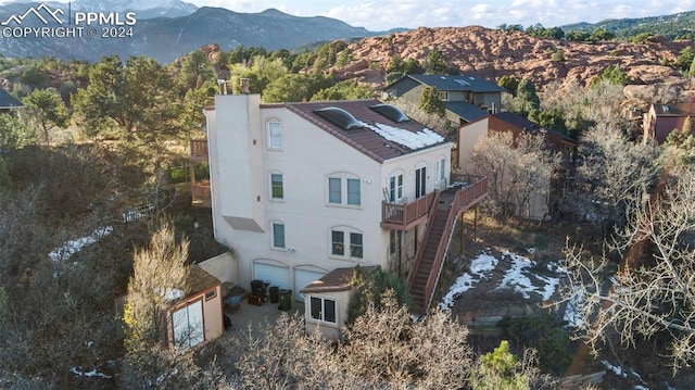 drone / aerial view featuring a mountain view