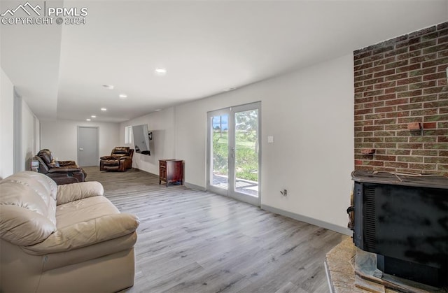 living room with light hardwood / wood-style floors