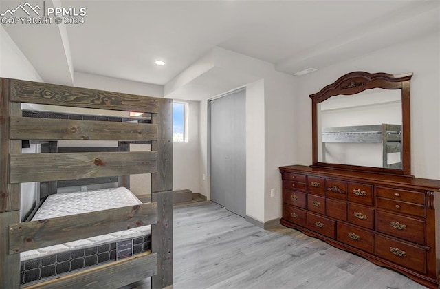 bedroom with light hardwood / wood-style floors