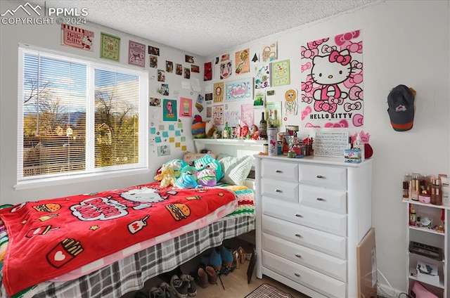 bedroom with a textured ceiling