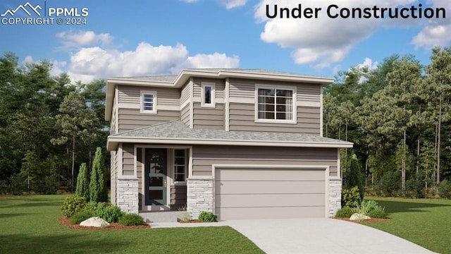 view of front of property with a front lawn and a garage