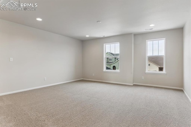 view of carpeted spare room