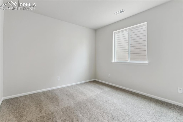 empty room featuring carpet floors