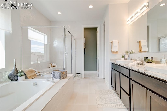 bathroom featuring separate shower and tub, tile patterned flooring, and vanity