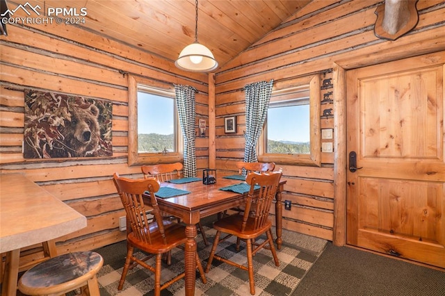 dining space with carpet, wood ceiling, and lofted ceiling